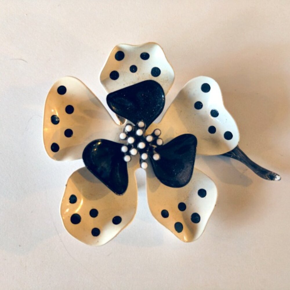 1970 Black & White Polka Dot Pin, made of enamel, and 1 inch across